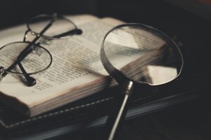 SEO copywriting research with magnifying glass over text